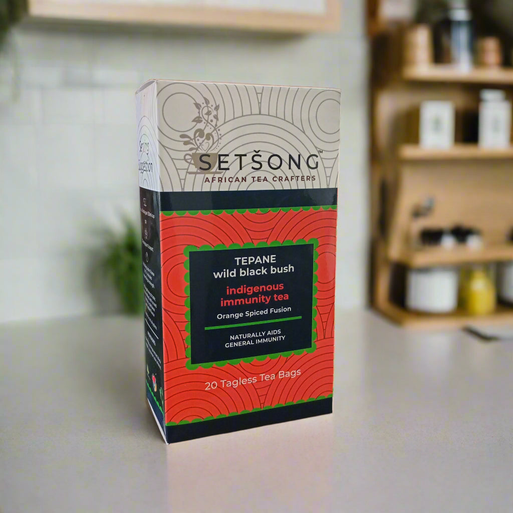 Tea boxes on a shelf with a blurred background