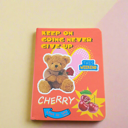 Red book with teddy bear illustration and text on a black background